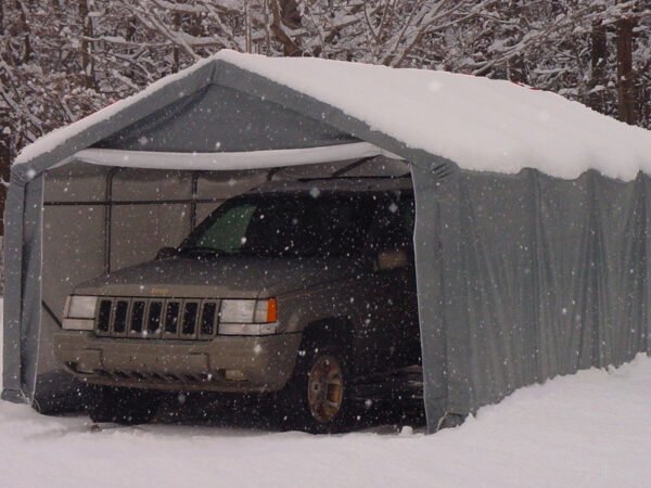 12x20 peak style portable garage with jeep in the snow